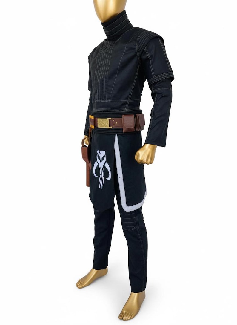May include: Black costume with a high collar, long sleeves, and white stitching. The costume includes a belt with pouches, a holster, and a black skirt with a white and grey design. The costume is displayed on a mannequin.