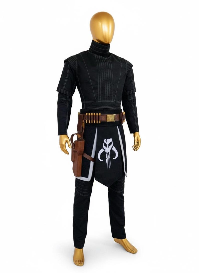 May include: Black costume with a high collar, brown belt with ammunition and a holster. The costume includes a black apron with a white skull design. The outfit is displayed on a mannequin.