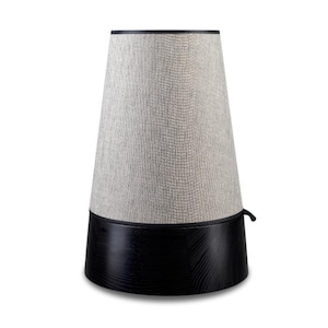 May include: A contemporary table lamp featuring a textured, light grey lampshade and a black wooden base. The lampshade has a gently tapered form. The base is a dark, solid colour. The lamp is designed for indoor use.