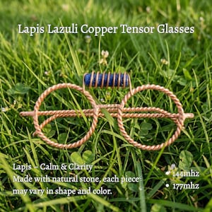 May include: Lapis Lazuli Copper Tensor Glasses featuring a blue cylindrical stone set on a twisted copper wire frame. The text reads Lapis Lazuli Copper Tensor Glasses, Lapis - Calm & Clarity, Made with natural stone, each piece may vary in shape and color, 144mhz, and 177mhz.