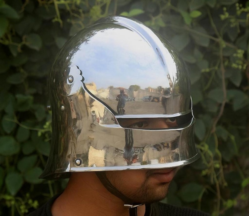German Sallet Helmet forged from 16-gauge mild steel, combining durability with authentic medieval design. Full protection for SCA, LARP, HMB, and Buhurt combat, with riveted and polished finish. Padded interior ensures comfort for long use. Perfect for cosplay, reenactment, and collectors of realistic knight armor.