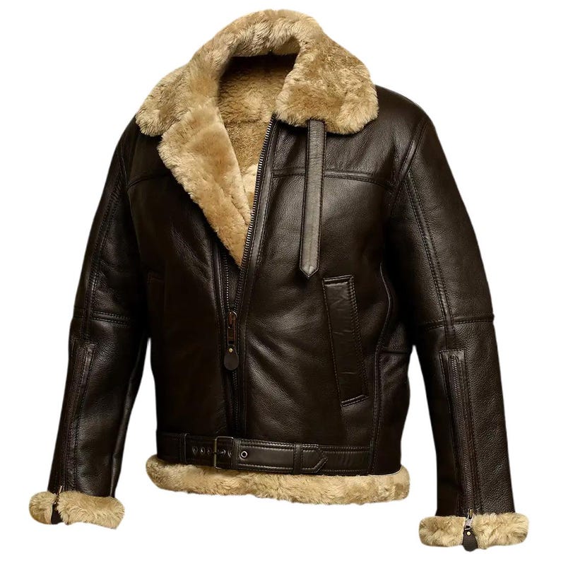 May include: A brown leather jacket with a shearling collar and lining. The jacket features a zip-up front, a belt at the waist, and shearling trim on the cuffs. The jacket has a classic aviator style.