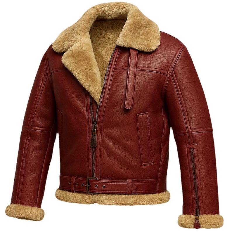 May include: A burgundy leather jacket with a shearling collar and lining. The jacket has a zip-up front, a belt at the waist, and zips on the sleeves. The shearling is light tan, and the leather has a smooth finish.