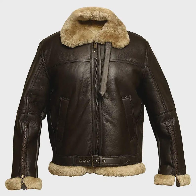 May include: A dark brown leather jacket with a shearling collar and lining. The jacket has a front zip, two front pockets, and a waist belt. The cuffs are also trimmed with shearling. A classic style of outerwear.