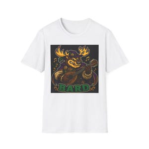 May include: White t-shirt with a cartoon moose playing a mandolin. The moose is depicted wearing a purple hat and cape, with the word "BARD" in green and gold. Musical notes are around the moose.