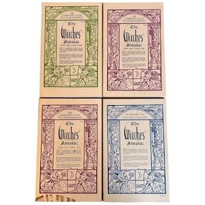 May include: Four copies of "The Witches' Almanac" are displayed, each with a unique color border: green, purple, maroon, and blue. The almanacs feature ornate illustrations and text, including the title and the phrase "The Complete Guide to Lunar Harmony."