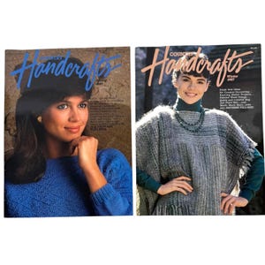 May include: Two Country Handcrafts magazines from 1987. The left cover features a person in a blue knit sweater with the text Spring 1987. The right cover features a person in a grey fringed poncho over a green shirt with the text Winter 1987.