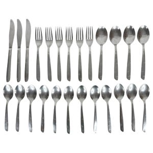 May include: A set of stainless steel flatware consisting of three knives, six forks, and eighteen spoons. Each piece features a smooth, polished finish with a simple, slender handle design, arranged in two rows against a plain white background.