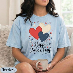 Light blue t-shirt with red, white, and blue hearts and "Happy Labor Day" text.