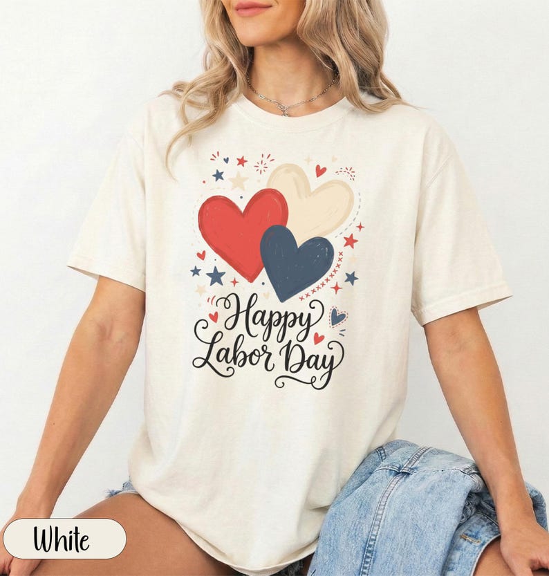 Cream t-shirt with red, white, and blue hearts and "Happy Labor Day" text.