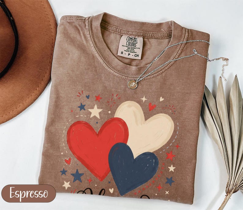Brown t-shirt with hearts and stars, "Espresso" label.