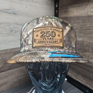 May include: A set of three ceramic mugs with a speckled, matte finish in cream, light grey, and dark grey. Each mug has a simple, minimalist design and a rounded handle.