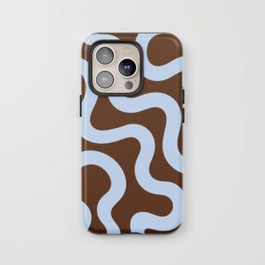 May include: A smartphone case featuring a dark brown background with a repeating pattern of light blue wavy lines. The case has a rectangular cutout at the top left corner for the camera lenses and flash, with a black border around the camera area.