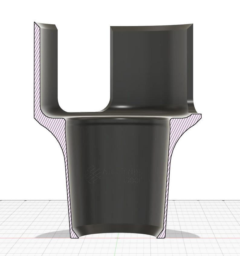 Puede incluir: Vista en secci&oacute;n de una herramienta negra en forma de U con una base acampanada. El interior est&aacute; marcado con l&iacute;neas diagonales moradas. La herramienta tiene un cuerpo cil&iacute;ndrico con una parte superior rectangular y una base curva y acampanada. El texto "ANSTUR" es visible.