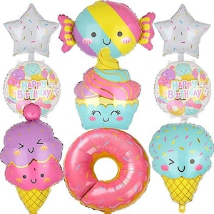 May include: A collection of colorful, cartoon-style foil balloons in the shape of a candy, cupcake, ice cream cone, donut, and star. The balloons feature smiling faces and the words "Happy Birthday."