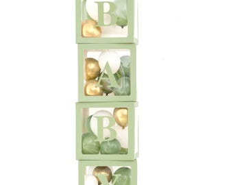Decoraciones para baby shower en color verde salvia. Set de cajas de globos BABY con 35 globos para la decoración de la fiesta de baby shower.