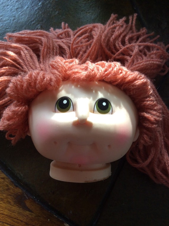 red yarn hair doll