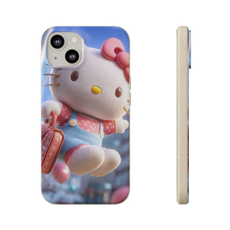 Op de afbeelding: Telefoonhoesje met een 3D-afbeelding van Hello Kitty. Het ontwerp toont Hello Kitty met een roze strik, rode tuinbroek en een rode koffer. De achtergrond is een vage stadsgezicht met een blauwe lucht.