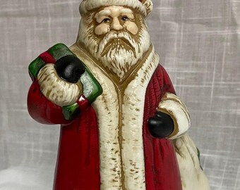 Vintage Claire Burke ceramic Santa Clause with bag 1990. Candy dish/Vase.