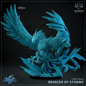 May include: A light blue phoenix figurine with expansive wings, sharp talons, and a long tail, standing on a 75mm base. The text 186mm, Mammoth Factory, Frostwilds II, and Bringer of Storms are visible on the dark background surrounding the figure.
