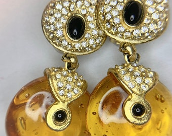 Boucles d'oreilles clip Roxanne Assoulin vintage en verre ambré et strass en verre et cristal