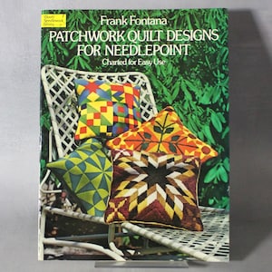 May include: Book cover featuring a white chair with four colorful needlepoint pillows. The book title is "Patchwork Quilt Designs for Needlepoint" by Frank Fontana. The book is part of the "Charm Needlecraft Series".