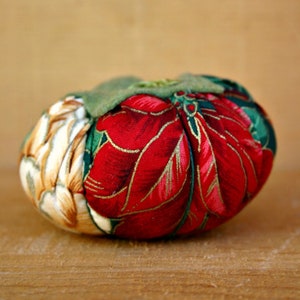 Tomato Pincushion with a Green Top