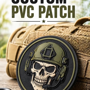 May include: A round, black PVC patch featuring a skull wearing a military helmet and headset. The skull is tan, the helmet is olive green, and the patch has a green border. The text "CUSTOM PVC PATCH" is above the patch.