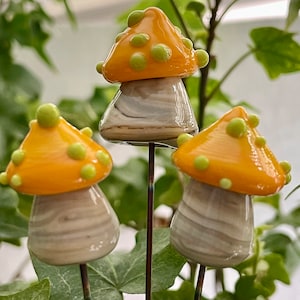 Lampwork glass mushroom toadstool with yellow cap and green dots by Glass Art Revealed