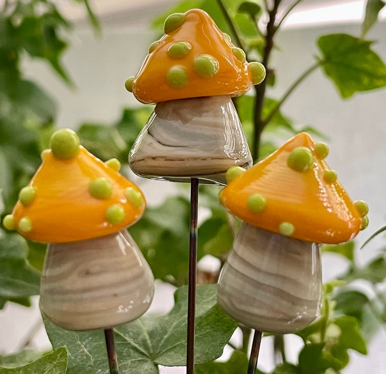 Lampwork glass mushroom toadstool with yellow cap and green dots by Glass Art Revealed