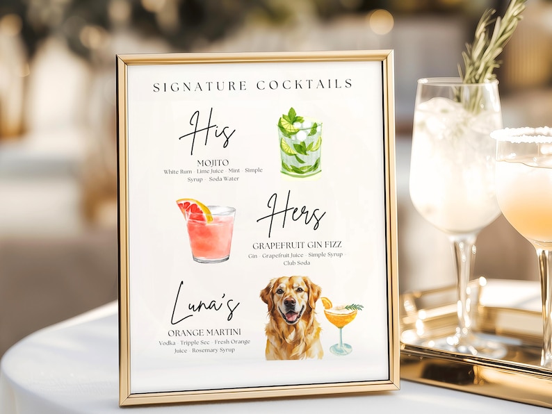 May include: A framed sign with gold trim displays a list of signature cocktails. The sign includes watercolor illustrations of a Mojito, a Grapefruit Gin Fizz, and an Orange Martini. A golden retriever is also pictured.