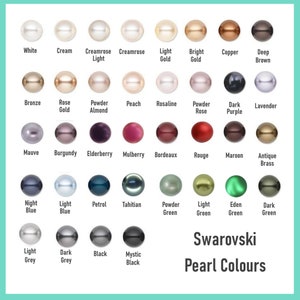 May include: A color chart displaying Swarovski pearl colors. The chart features a grid of pearl beads in various colors, including white, cream, gold, and black. Text at the bottom reads "Swarovski Pearl Colours."