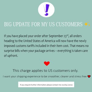 May include: An announcement on a teal background with the text "BIG UPDATE FOR MY US CUSTOMERS." The text explains that US customers' orders after September 23rd include customs tariffs in the item cost. A red heart and an exclamation point are also included.