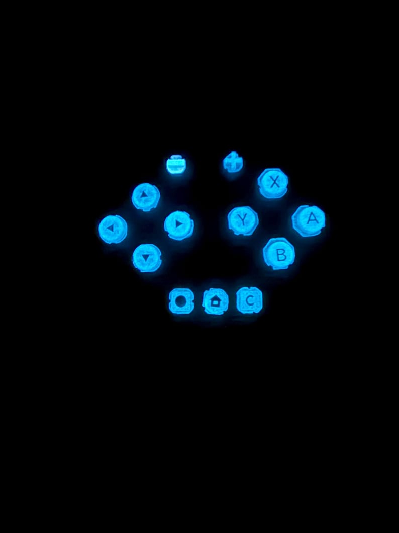 May include: A set of three ceramic nesting bowls in shades of blue, green, and white. The bowls feature a speckled glaze and a simple, modern design. The largest bowl is approximately 7 inches in diameter.