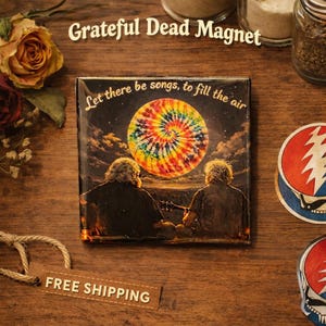 May include: Square magnet featuring a colorful tie-dye design with the text "Let there be songs, to fill the air." The magnet depicts two figures playing instruments under a vibrant, swirling sun. The words "Grateful Dead Magnet" are at the top.