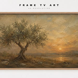 May include: A landscape oil painting in a light wood frame featuring a gnarled olive tree in the foreground, a calm body of water, and a golden sunset sky. The text FRAME TV ART 4K RESOLUTION is printed in black above the framed artwork.