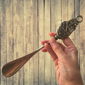 Vintage messing schoenlepel - decoratief scheepsontwerp