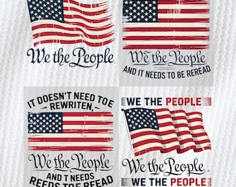 May include: Four designs showcasing the American flag with the phrase "We the People." The flags are in red, white, and blue, with different fonts and arrangements. Some designs include additional text such as "It doesn't need to be rewritten" and "and it needs to be reread."