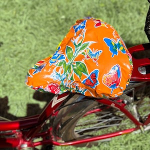 Oranje fietsstoeltje- zadelhoes- waterdicht tafelzeil- oranje vlinderzadelhoes voor cruiser-fietsen