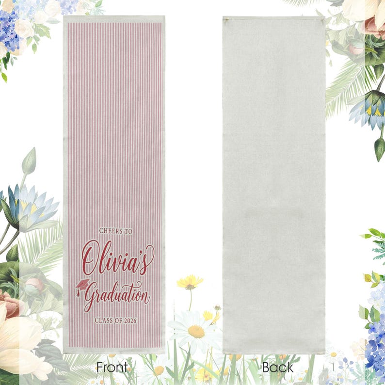 May include: A graduation banner with a red and white striped pattern. The front of the banner reads "Cheers to Olivia's Graduation" with a graduation cap illustration and "Class of 2026". The back is plain white.
