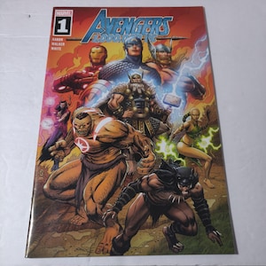May include: Avengers #1 comic book cover featuring multiple superheroes. The cover art showcases Iron Man, Captain America, Thor, and other characters in action. The title "Avengers 2000" is prominently displayed.