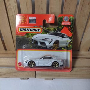 Streichholzschachtel-Autotoyota Supra '23 Short Card Packet Versiegelt