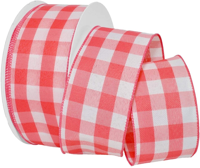 May include: A roll of pink and white gingham ribbon. The ribbon is 2.5 inches wide and has a wired edge.