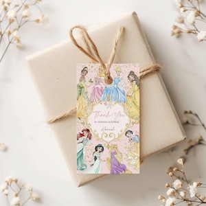 以下が含まれることがあります： ベージュ色の紙で包まれたギフトと装飾タグ。タグにはプリンセスのイラストと「Thank You for celebrating my birthday! Hannah.」の文字が描かれています。