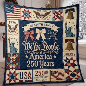 May include: A navy blue quilt featuring a central banner with the text The Smith Family, We the People, America 250 Years, and 1776-2026. The design includes American flags, bald eagles, the Statue of Liberty, Liberty bells, and red, white, and blue bows.