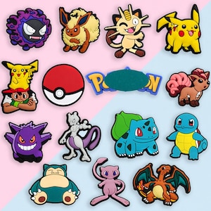 May include: A collection of colorful cartoon character charms, including Pikachu, Eevee, and others. The charms are in various shapes and colors, with a red and white Pokeball and the word "Pokemon" in blue and yellow.