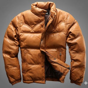 Peut inclure: Veste matelassée en cuir marron avec un col montant et une fermeture éclair. La veste a un design matelassé et plusieurs poches. C'est un vêtement d'extérieur chaud et élégant.