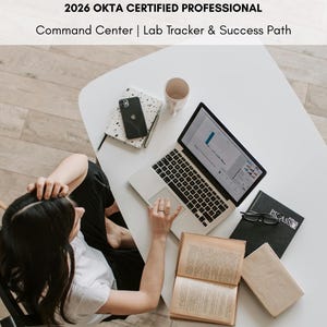 May include: A person working on a laptop at a white table. The table also holds a smartphone, a coffee cup, books, and glasses. The text "Safey Shield" and "2026 OKTA CERTIFIED PROFESSIONAL" are visible.