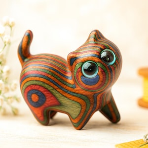 Hand-Carved Wooden Cat Figurine: Unique Desk Decor