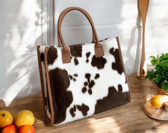 Borsa tote morbida in peluche con motivo a mucca